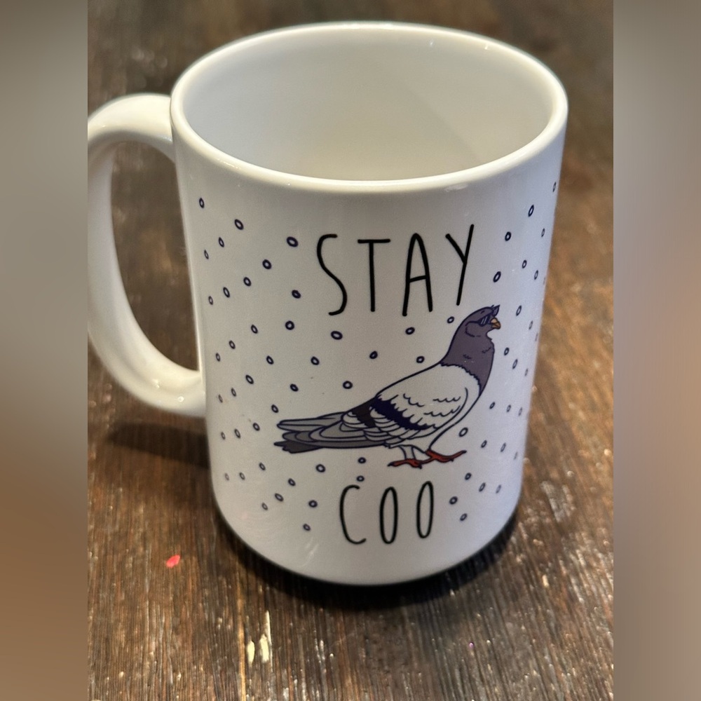 EUC funny Look Human coffee mug.  Very sturdy.